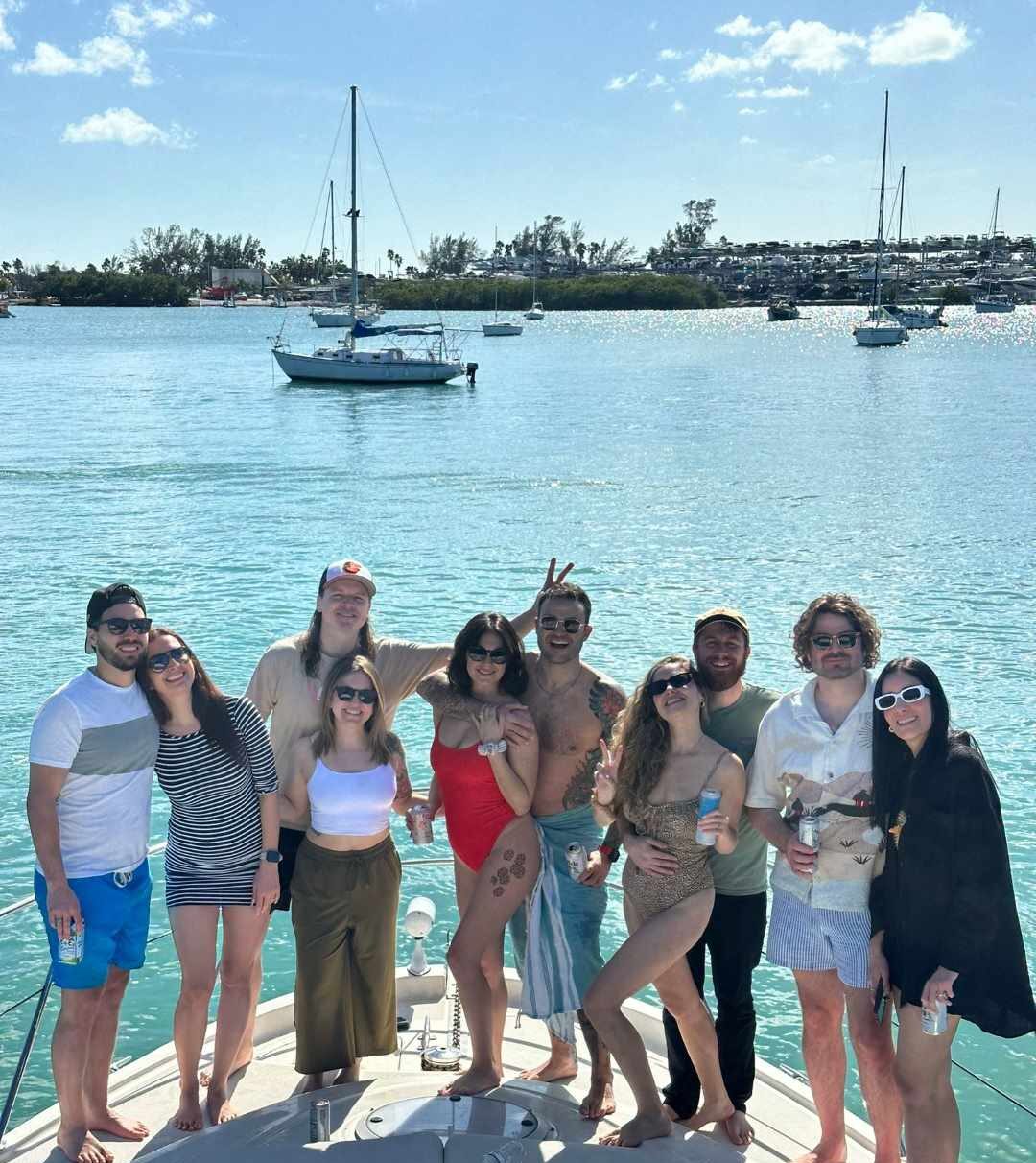 Group of friends enjoying a boat charter in miami